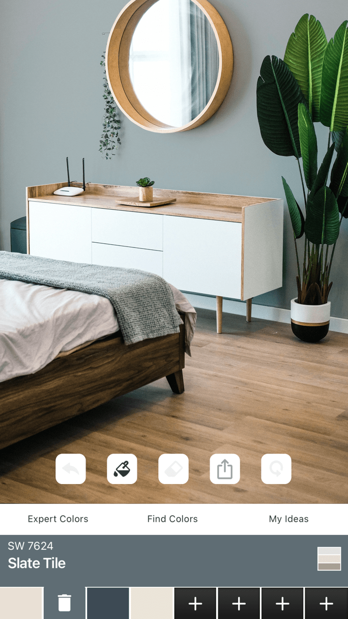 bedroom with dresser and mirror